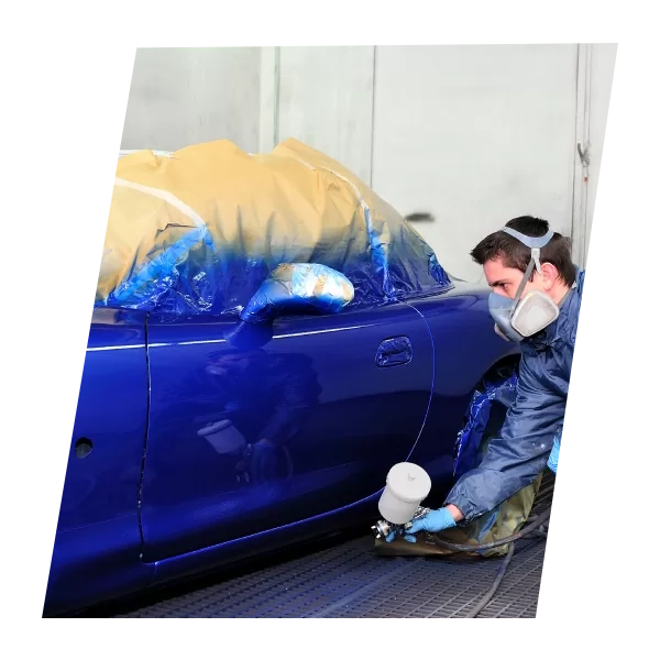 Technicians working in the DigiBillMate Cars workshop